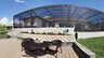 Verglaster Poolbereich mit erhöhter Blumenmauer und rundem Tisch auf unterem Deck - Traum-Urlaub-Florida