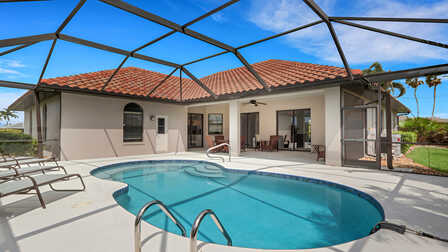 Villa Shakira Cape Coral Ferienhaus mit überdachtem Poolbereich, Liegestühlen und Terrasse - Traum Urlaub Florida 