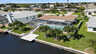 Blick von oben auf den Kanal und die große Poolterrasse - Traum-Urlaub-Florida