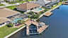 Blick aus der Vogelperspektive auf die Kanalterrasse, Dock und Lift - Traum-Urlaub-Florida