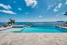 Infinity-Pool mit integriertem Whirlpool und Blick auf den Fluss. - Traum-Urlaub-Florida