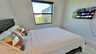 Gästezimmer mit Fernseher und Blick nach draußen - Traum-Urlaub-Florida