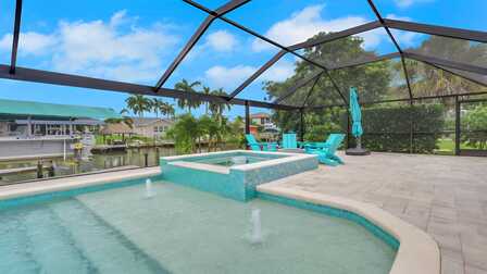 Villa Kamala in Cape Coral mit Pool, Whirlpool und überdachter Terrasse am Kanal. - Traum Urlaub Florida 