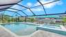 Pool und Whirlpool der Villa Kamala in Cape Coral mit Blick auf den Kanal und Bootslift. - Traum-Urlaub-Florida