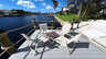 Sitzgruppe mit fünf Stühlen auf dem Bootssteg mit Blick auf den Kanal der Villa Lavinia in Cape Coral - Traum-Urlaub-Florida