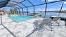 Blick von der überdachten Terrasse auf den Pool, den Whirlpool und den breiten Kanal mit Bootsdock der Villa Aldiana in Cape Coral - Traum-Urlaub-Florida