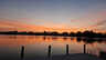 Stimmungsvolle Abenddämmerung am See mit Steg - traumhafte Kulisse so richtig zum Träumen - Traum-Urlaub-Florida