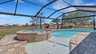 Der beheizte Pool mit integriertem Spa laden zum Entspannen ein - Traum-Urlaub-Florida