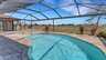 Genießen Sie den sonnigen Terrassenbereich mit Pool und Spa - ideal für entspannte Urlaubstage - Traum-Urlaub-Florida