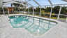 Geschützter Poolbereich mit Blick aufs Wasser - ideal für entspannte Badetage in privater Atmosphäre - Traum-Urlaub-Florida