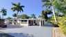 Ferienvilla in Fort Myers mit überdachtem Carport, tropischem Garten und großzügigem Außenbereich unter Palmen. - Traum-Urlaub-Florida