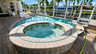 Ferienhaus Villa Almare in Cape Coral mit rundem erhöhtem Spa, geschwungenem Pool und Bootsdock am Kanal - Traum-Urlaub-Florida