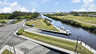 Bootsrampe am Kanal mit überdachten Liegeplätzen, Straßenkreuzung und großer Wiese - Traum-Urlaub-Florida