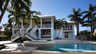 Zweistöckiges Haus mit erhöhten Veranden, Doppeltreppen, geschwungenem Pool und rundem Spa - Traum-Urlaub-Florida