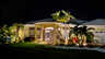 die beleuchtete Villa Rosegarden bei Nacht - Traum-Urlaub-Florida