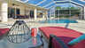 Blick auf den Pool und die überdachte Terrasse - Traum-Urlaub-Florida