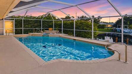 Ferienhaus Villa Su Casa in Cape Coral mit Pool, erhöhtem Spa und Kanalblick - Traum Urlaub Florida 