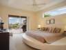 Schlafzimmer mit Blick auf den Poolbereich - Traum-Urlaub-Florida