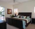 Hauptschlafzimmer (uebergrossem Doppelbett) mit Ausgang auf die Terrasse - Traum-Urlaub-Florida