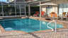 Überdachte Terrasse mit Tisch und Stühlen - Traum-Urlaub-Florida